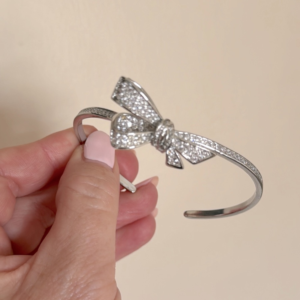 Silver Bangle Bow Bracelet with Faux Diamonds